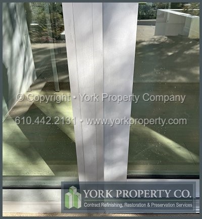 We repair acid stains on clear anodized aluminum window frames.