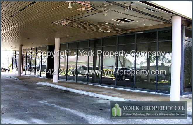 Cleaning dirty metal doors, washing stained storefront window frames repairing and oxidized metal refinishing.