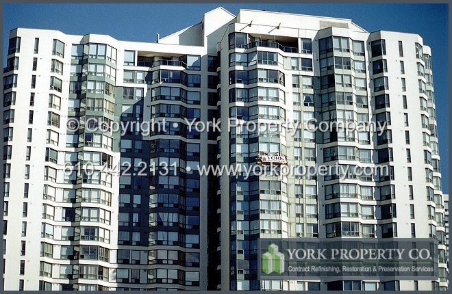 Protecting, preserving, sealing, refurbishing, painting, maintaining, repairing and refinishing painted metal curtain wall panels, balcony railings, sliding doors, ground floor storefront window frames and entrance doors.