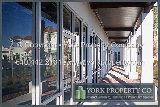 We are experts at oxidized anodized aluminum cladding cleaning, weathered anodized aluminum panel restoration, stained anodized aluminum building faade panel refinishing and faded anodized aluminum storefront window frame maintenance.