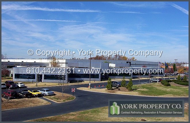 Stainless steel building facade restoration cleaning.