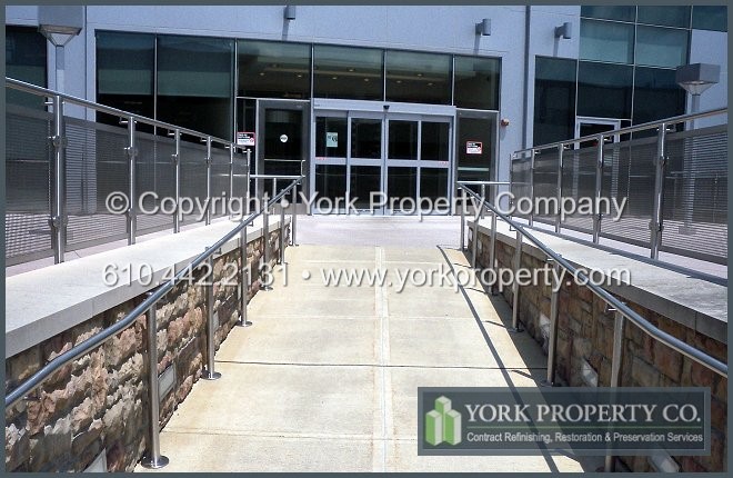 Refinishing stainless steel railings.