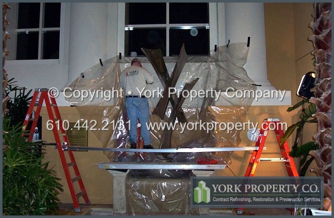 Cleaning stainless steel statues and refinishing stainless steel statues.