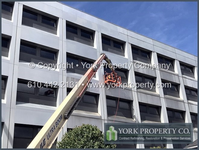 Refurbishing stained silver colored anodized aluminum cladding.